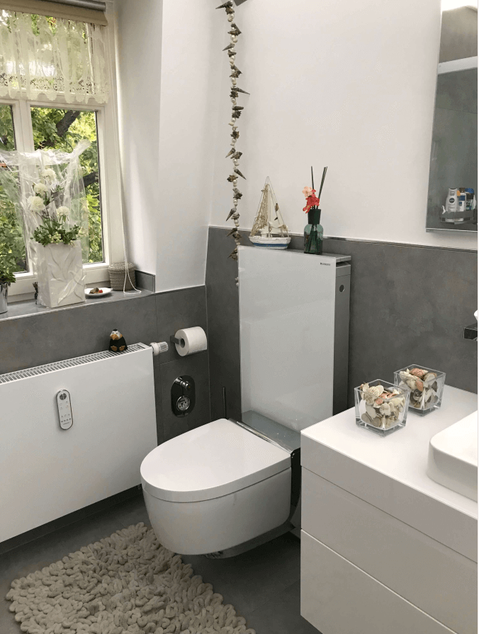 Wasch-WC mit automatischer Deckelöffnung und Sitzheizung